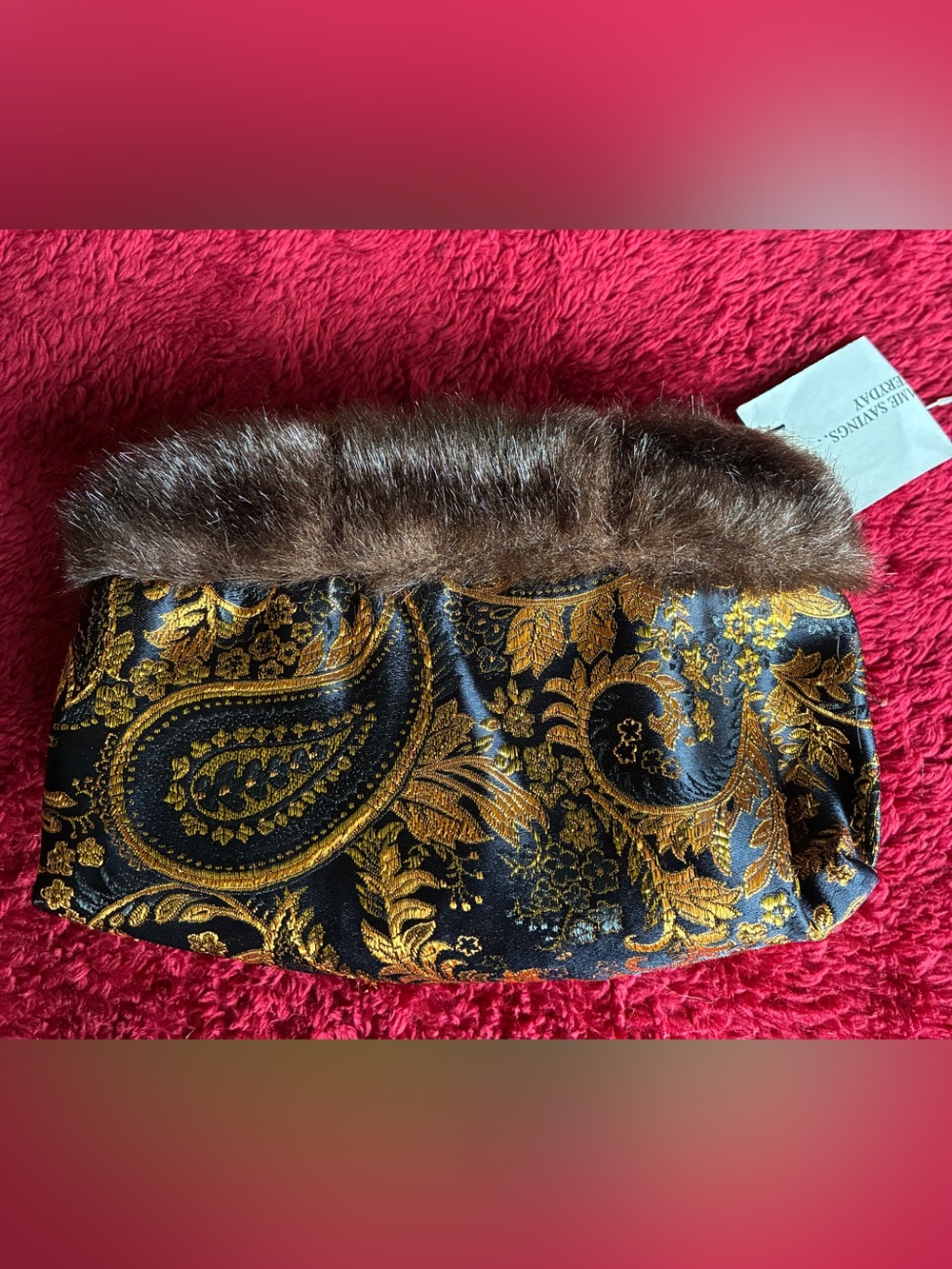 Black and gold paisley brocade bag with fake fur trim